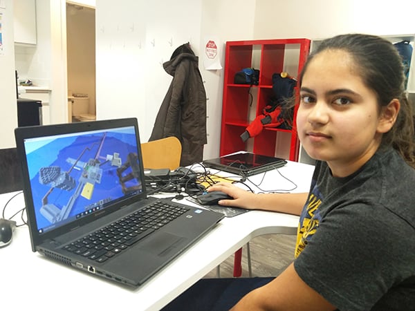 Child playing Minecraft